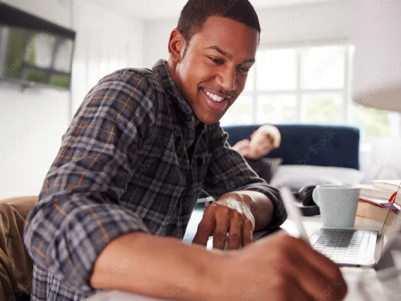 student at computer working