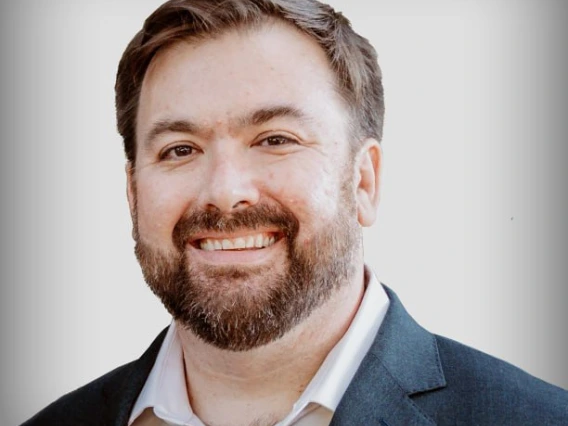 Headshot of faculty member Paul Hill
