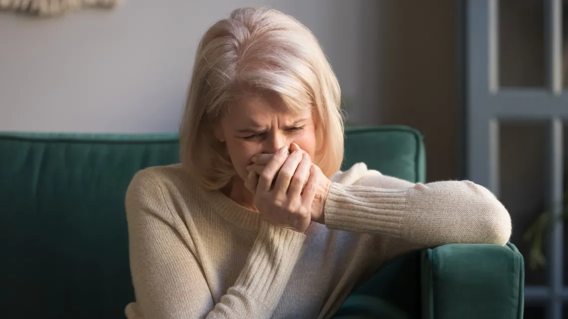 Older woman crying