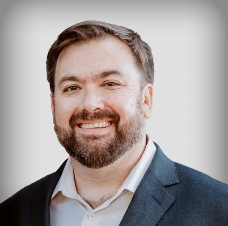 Headshot of faculty member Paul Hill