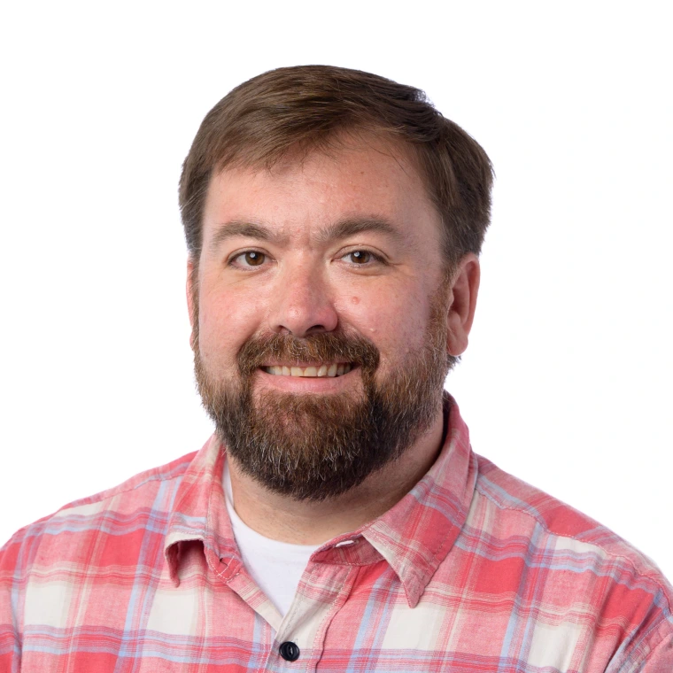 Headshot for faculty member Paul Hill