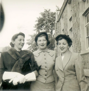 Adrienne G. is pictured in the center with her 2 sisters, Louise "Weezie" (left) and Yvonne (right).