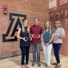 Psychology faculty members Christy Ball, Adam Lazarewicz, Ashley Jordan, & Linda Hollis standing with their Teaching Mentoring awards